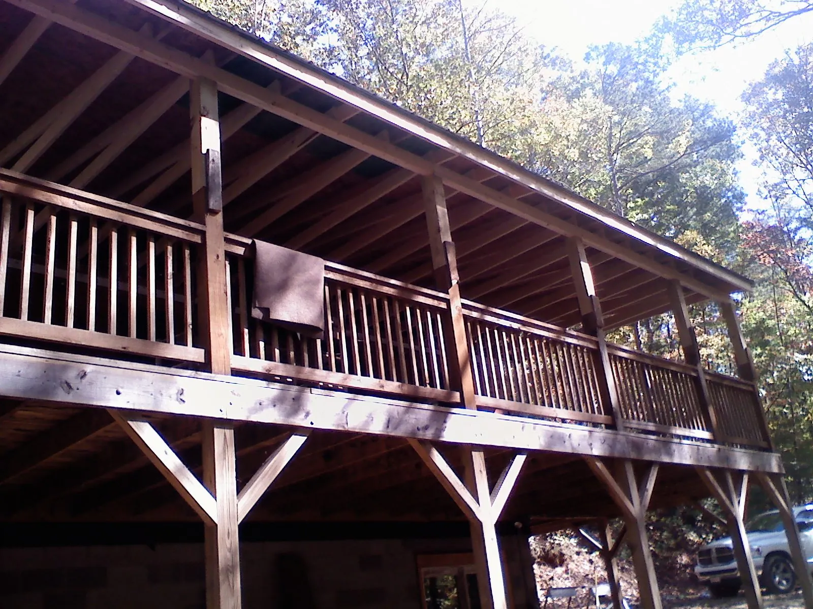 Timber framing under a new elevated porch and deck — Roof Leak Repair in Flatonia by Roofing Brothers